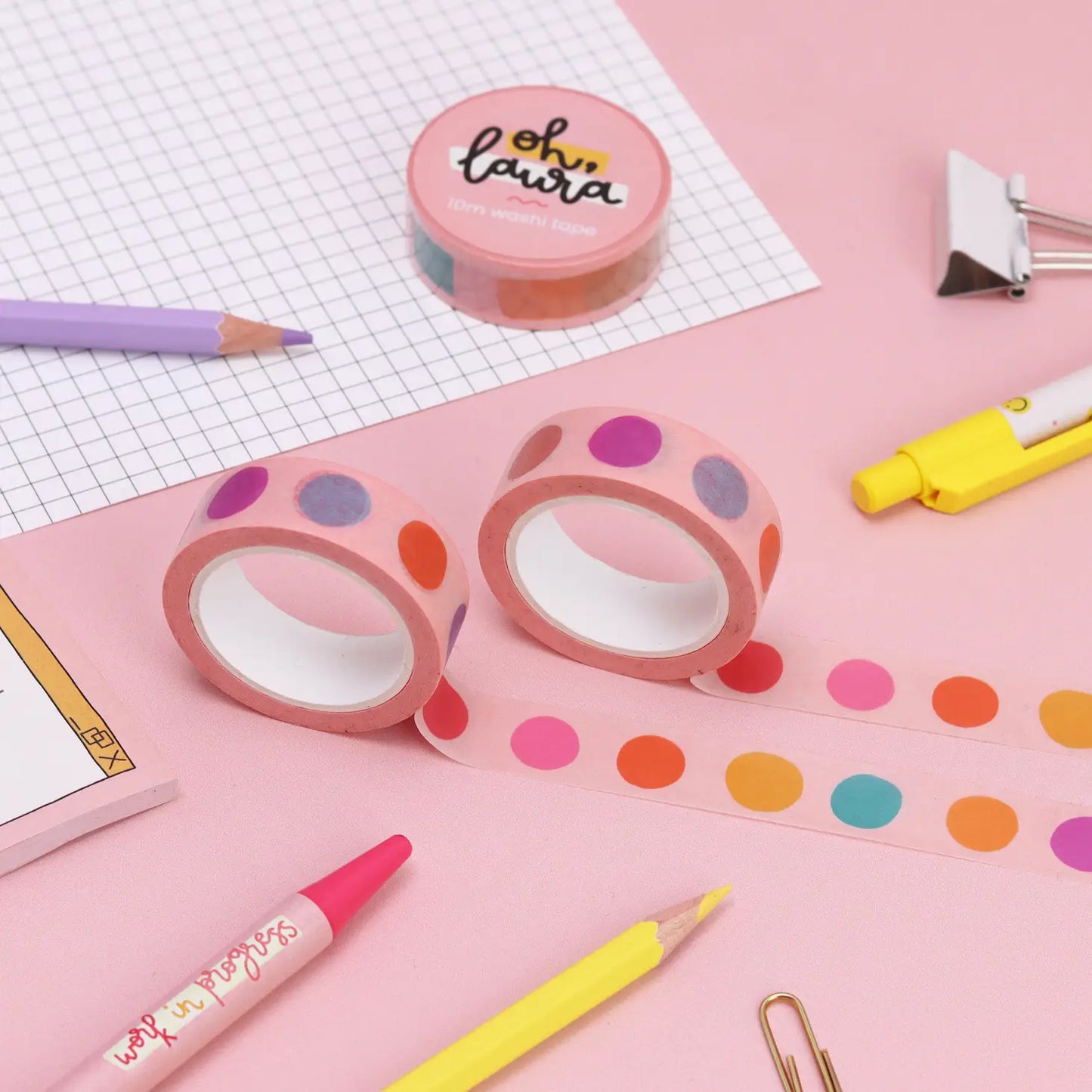 colourful dots washi tape, surrounded by other stationery items.