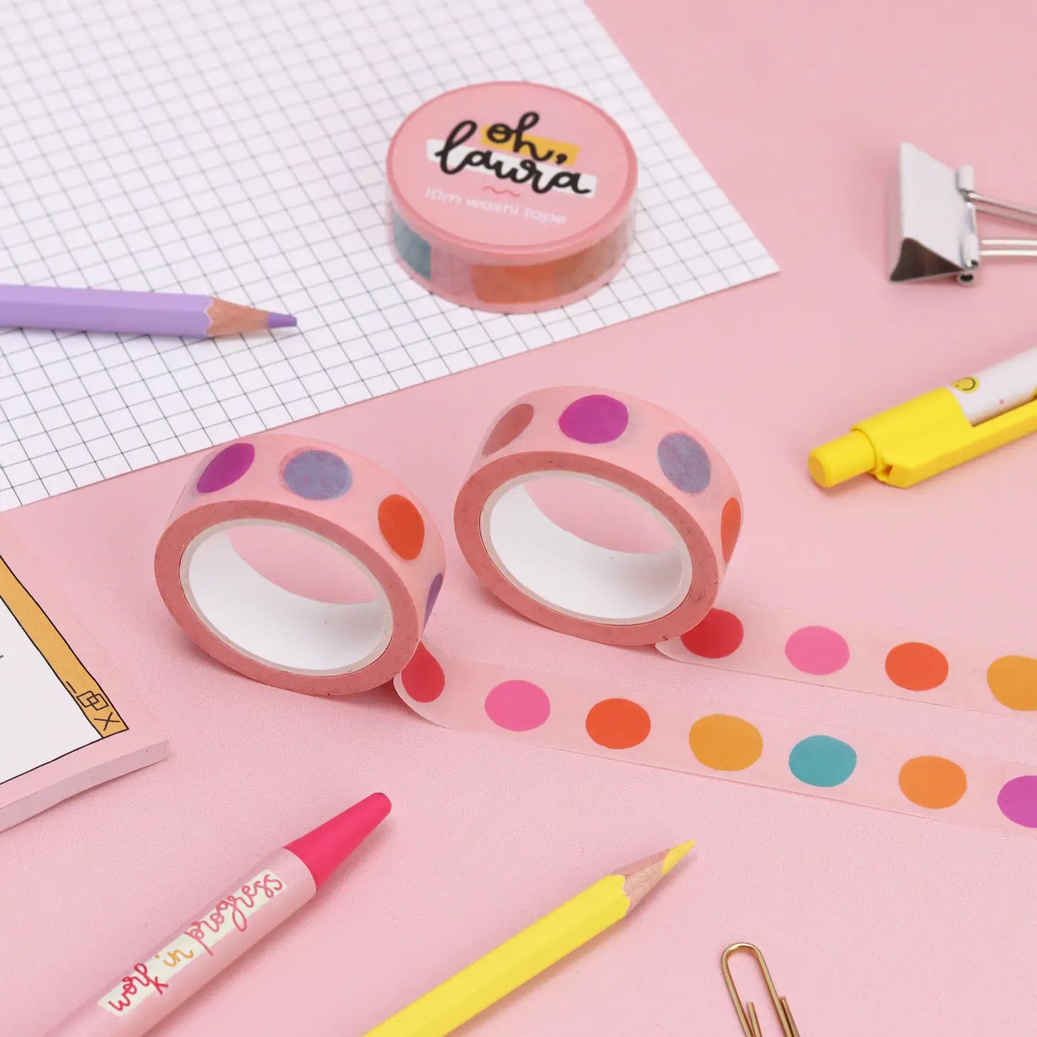 colourful dots washi tape, surrounded by other stationery items.